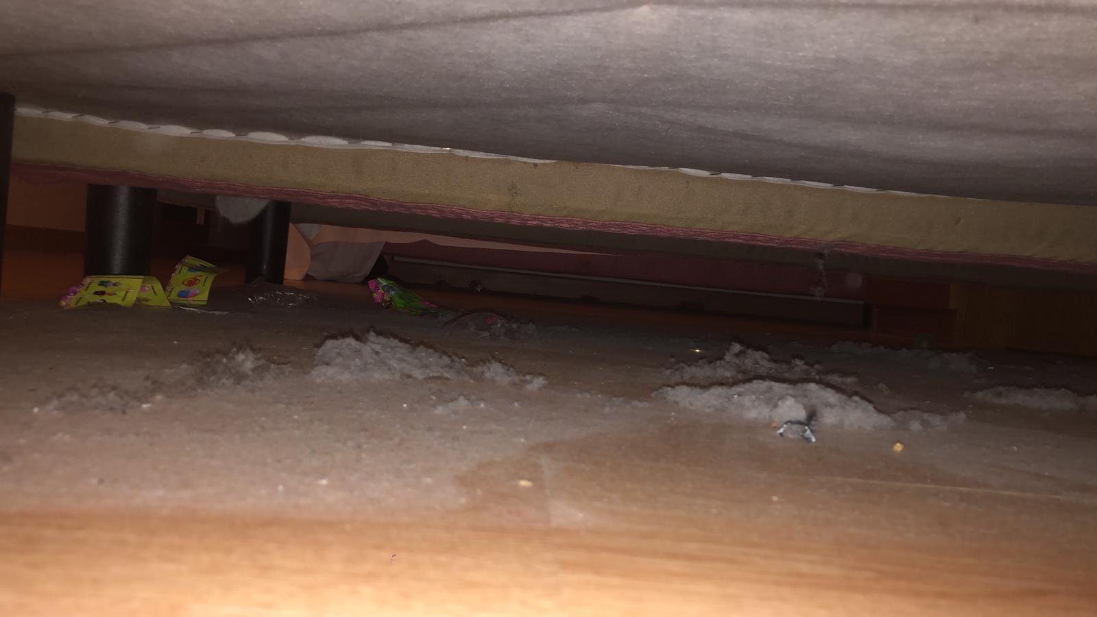 Under my bed when I entered. 