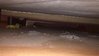 Under my bed when I entered.