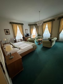 Primary bedroom with sitting area