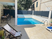 Pool area which is part of the apartments. Perfect to cool off in after a day of exploring :)