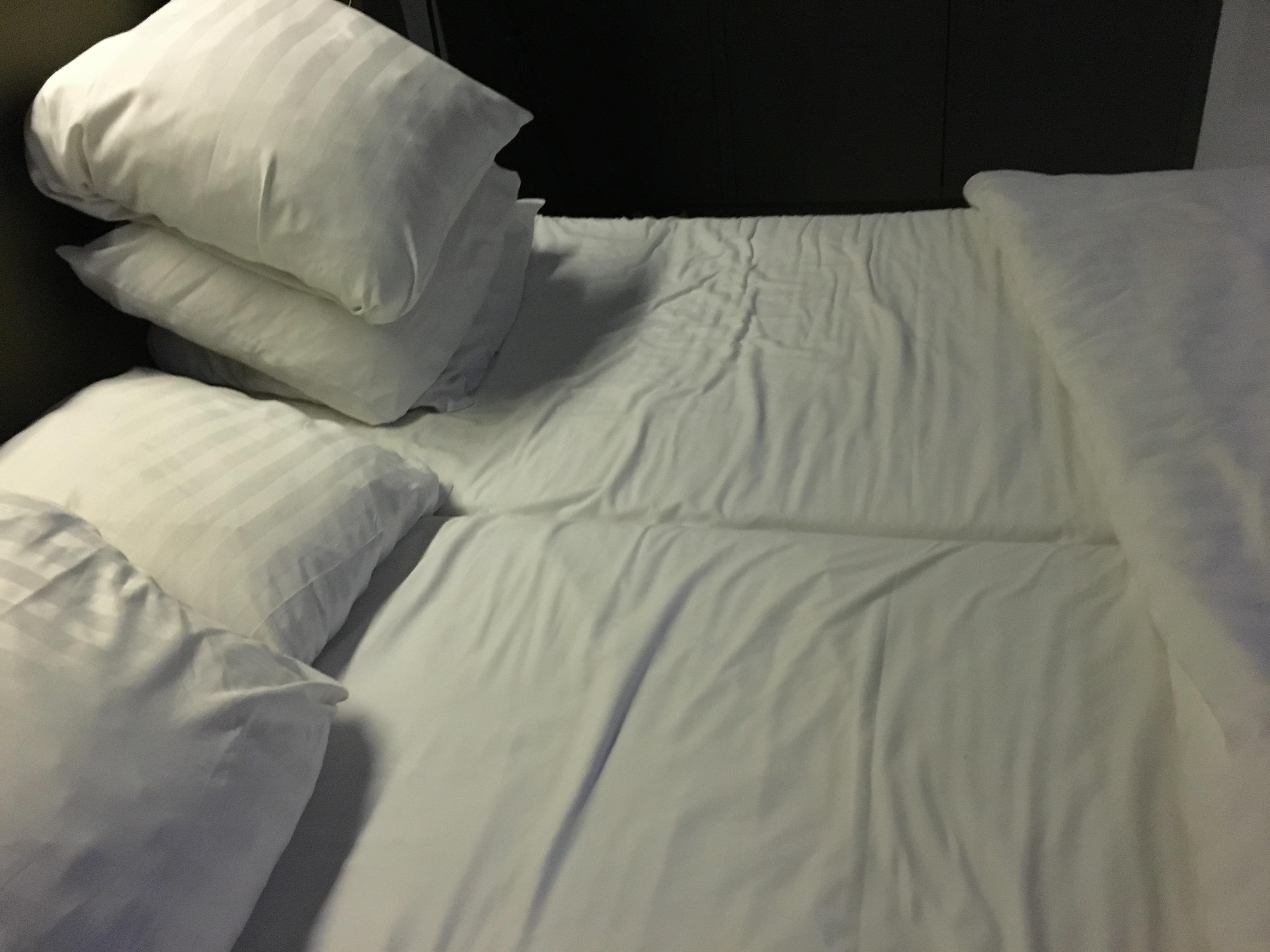Can see the twin matresses devide our king bed