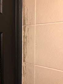 Dirt behind the door