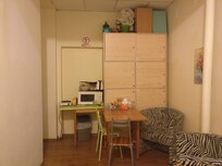 The supposed kitchen, which lacks adequate cooking facilities, food preparation area or even a sink.