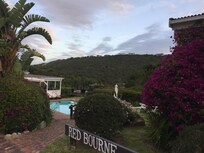 Overlooking pool and verandas.