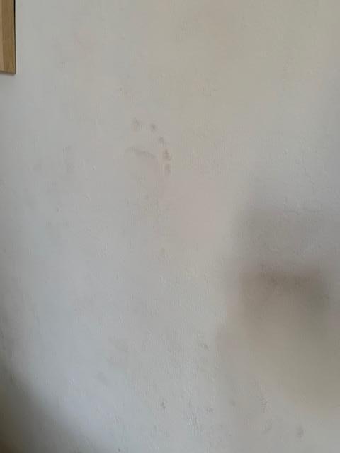 Foot prints on the walls. Walls were filthy