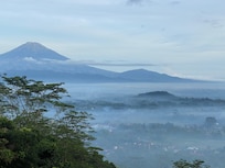The mist rising above the valley early morning