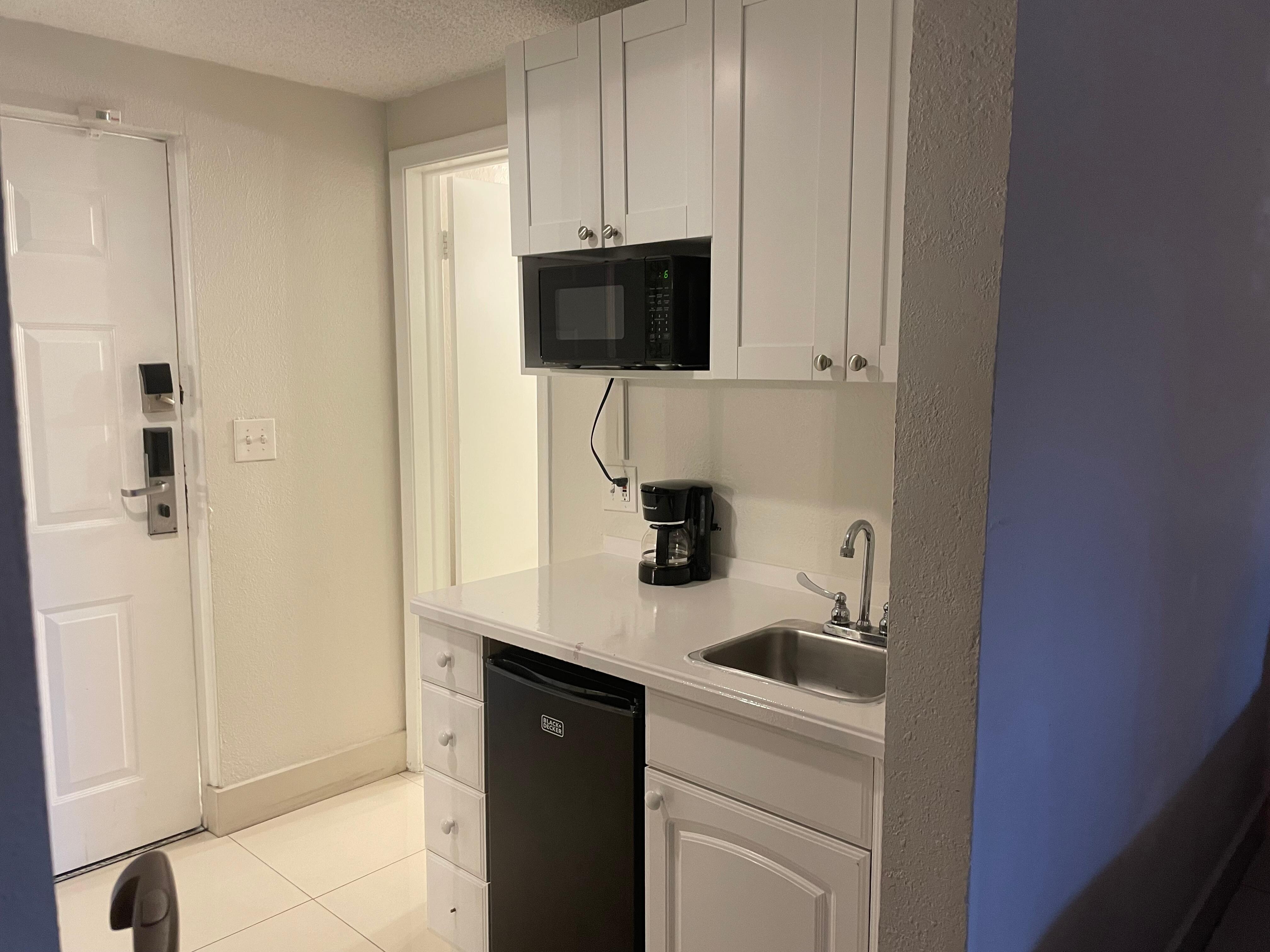 very clean well equipped kitchen and very clean bath
