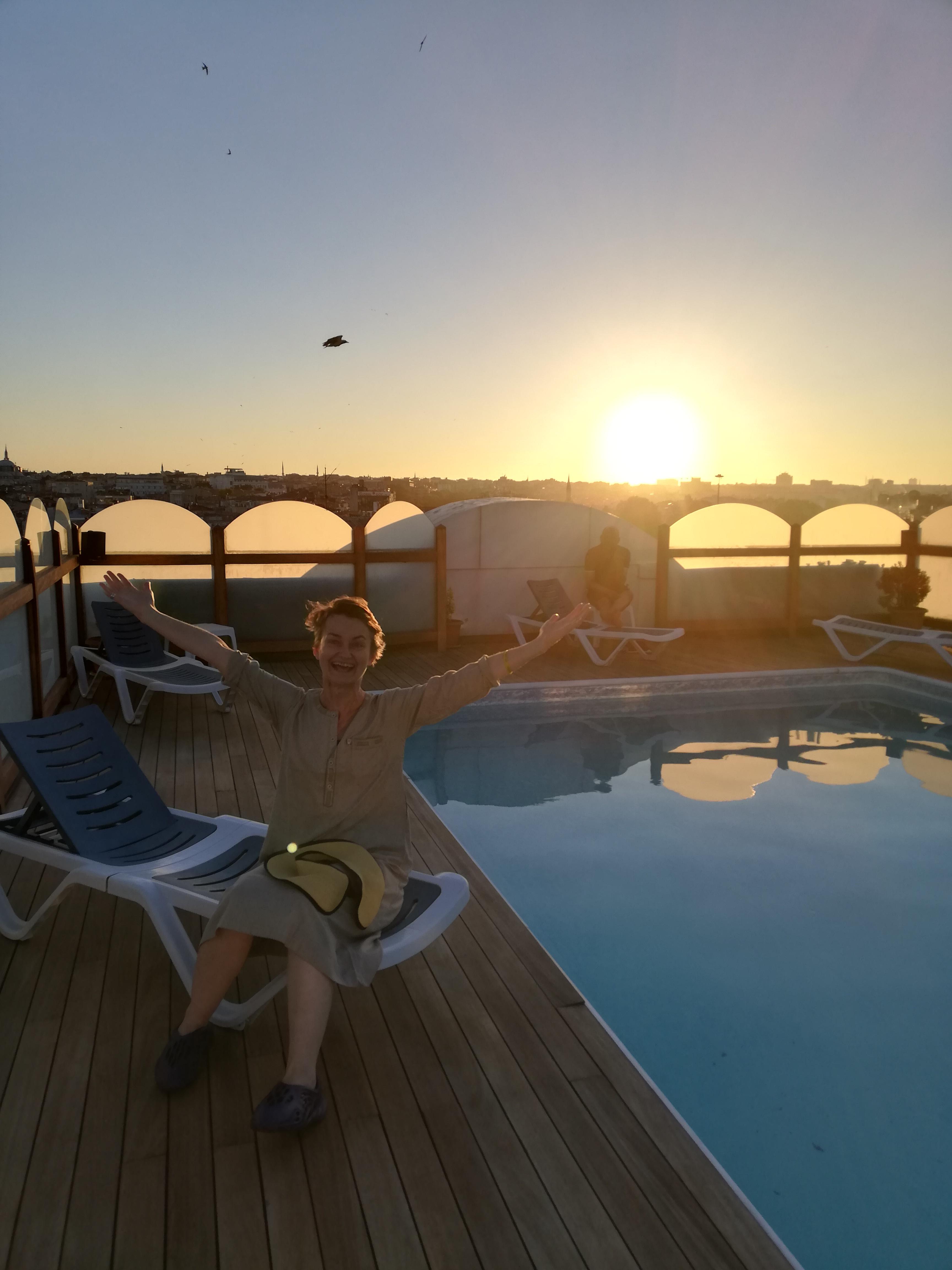 A swim on a rooftop pool with panoramic views, at sunset. A dream come true... 