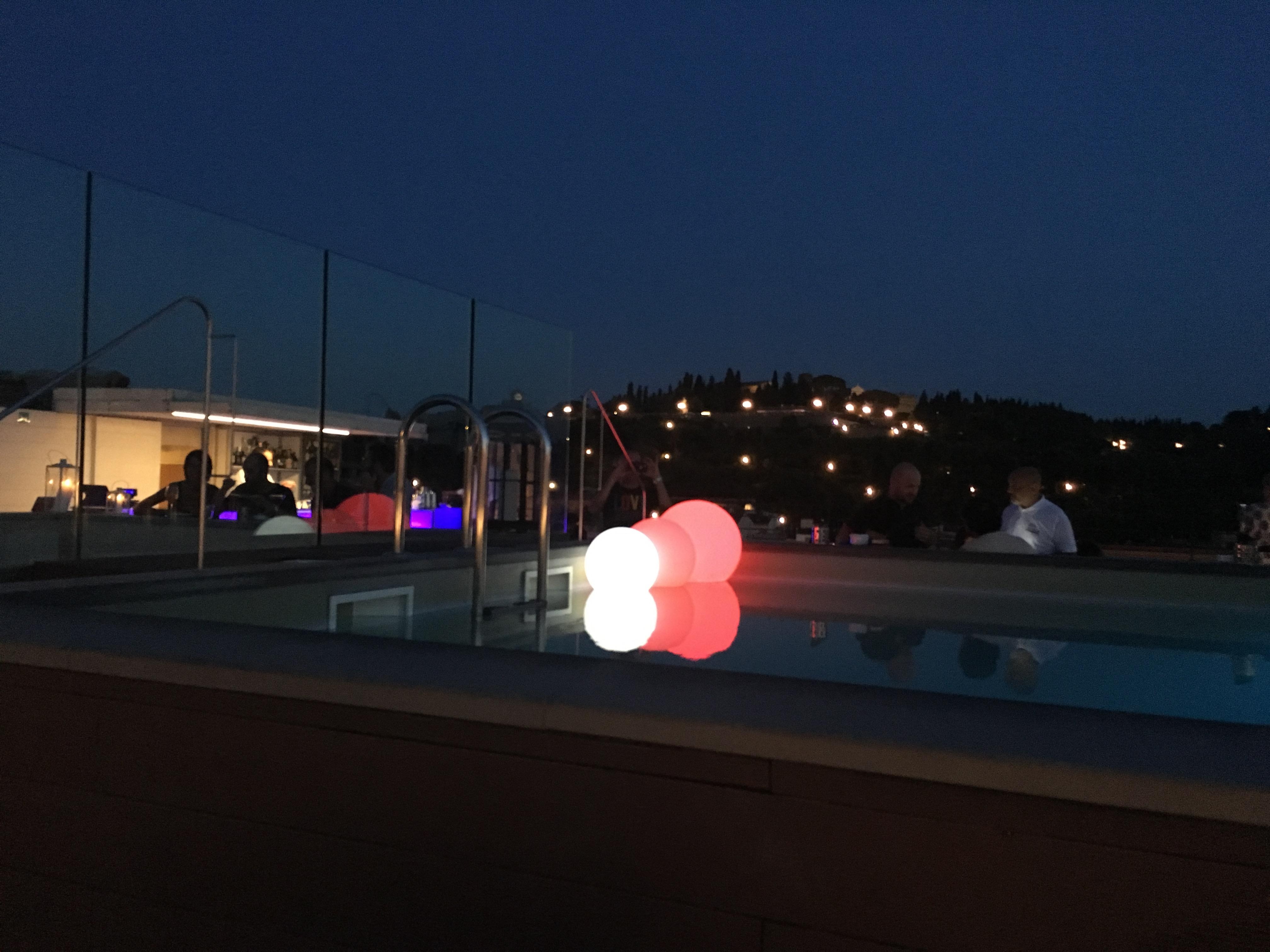 Rooftop pool and bar at night. Great for cocktails