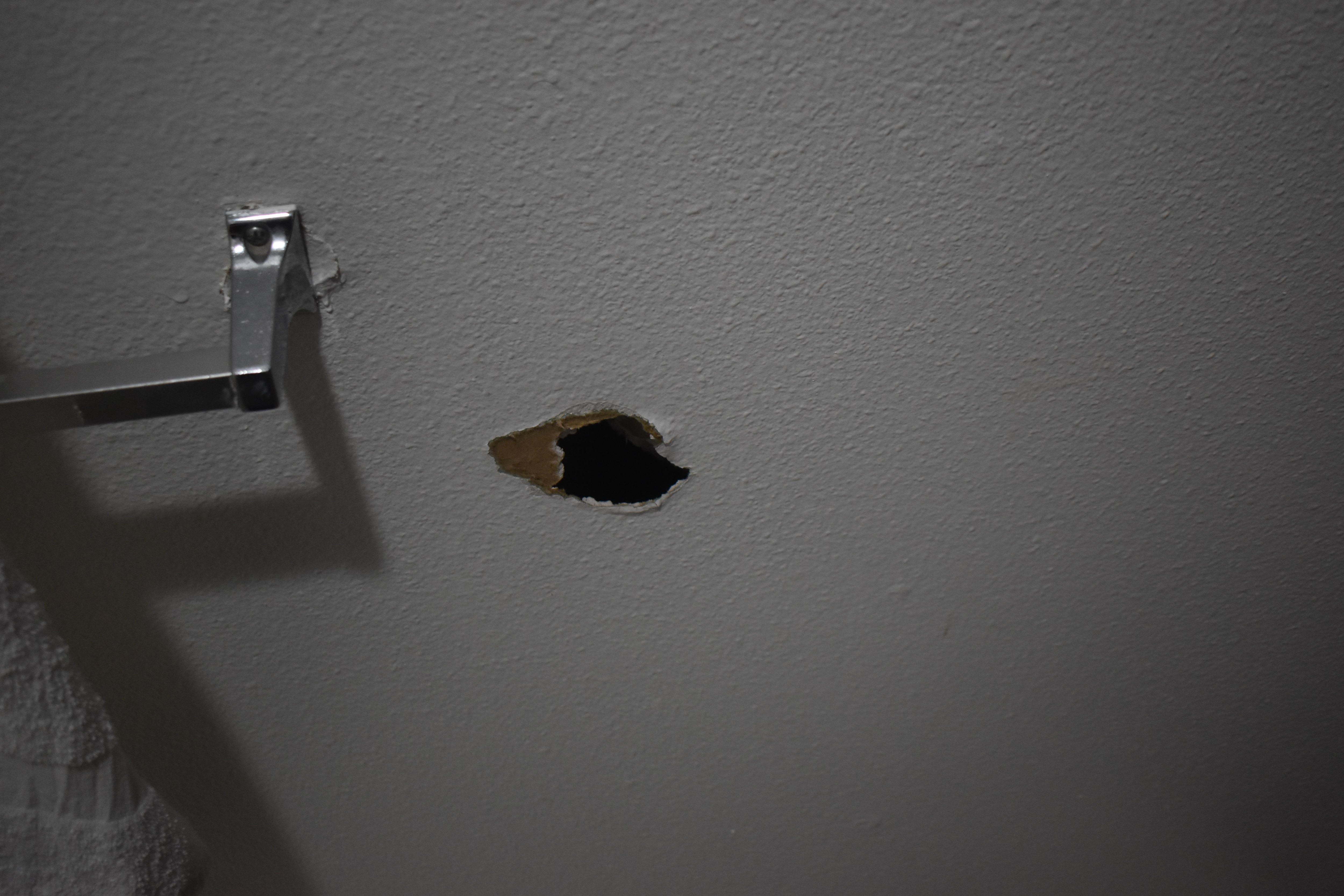 hole in bathroom wall