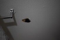 hole in bathroom wall