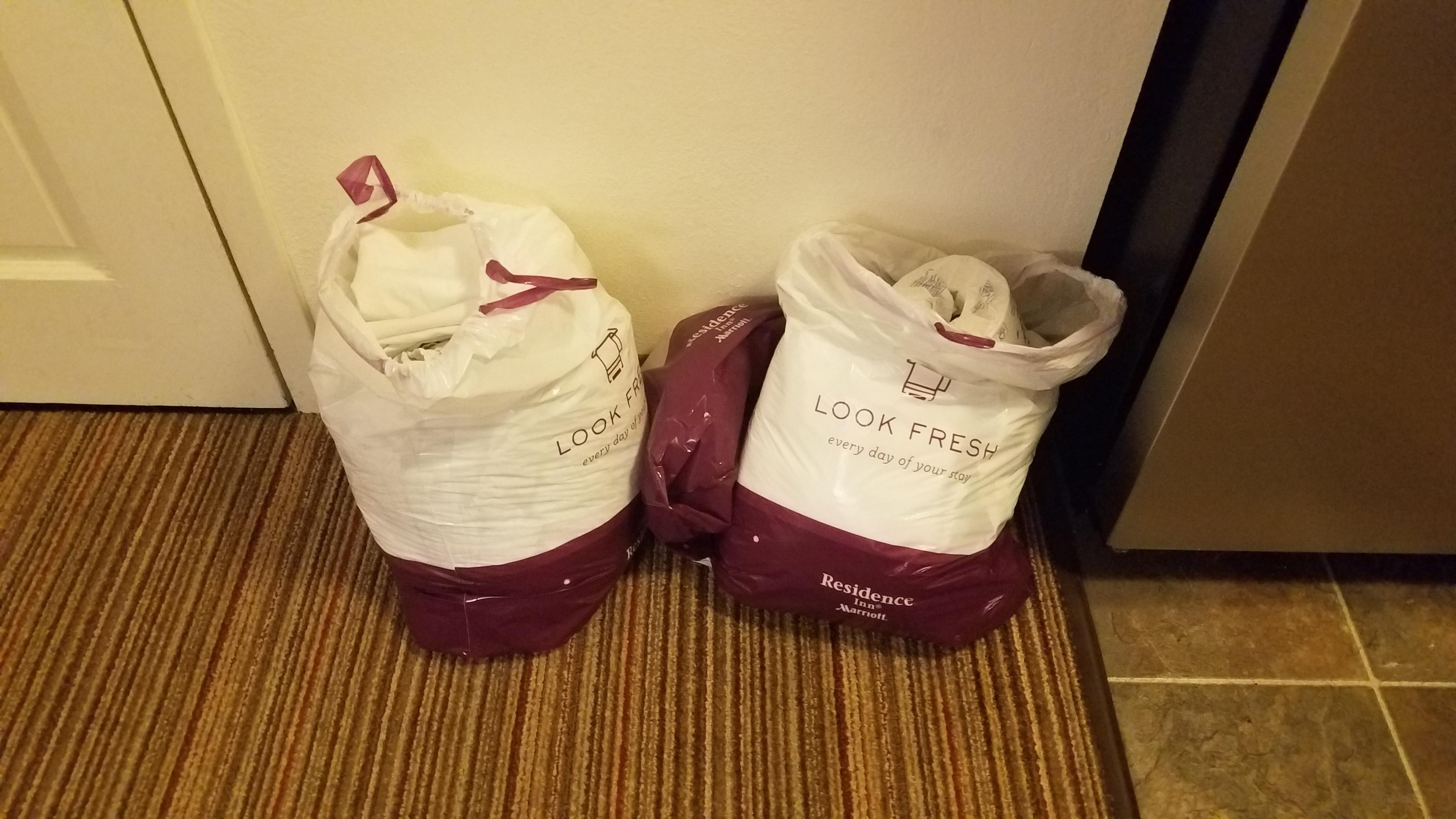 The bags of towels and sheets after no show on housekeeping