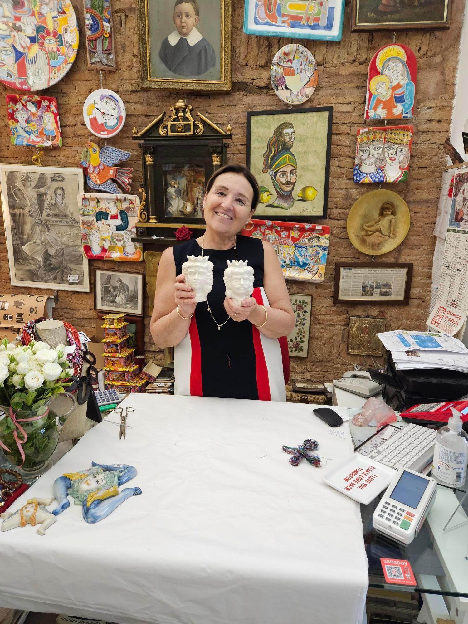 Very friendly shop owner in a cute shop that has Sicilian art and antiques off Etnea street in city center