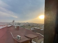 Back side of hotel looking across Istanbul at sunset (8 pm / 20:00)