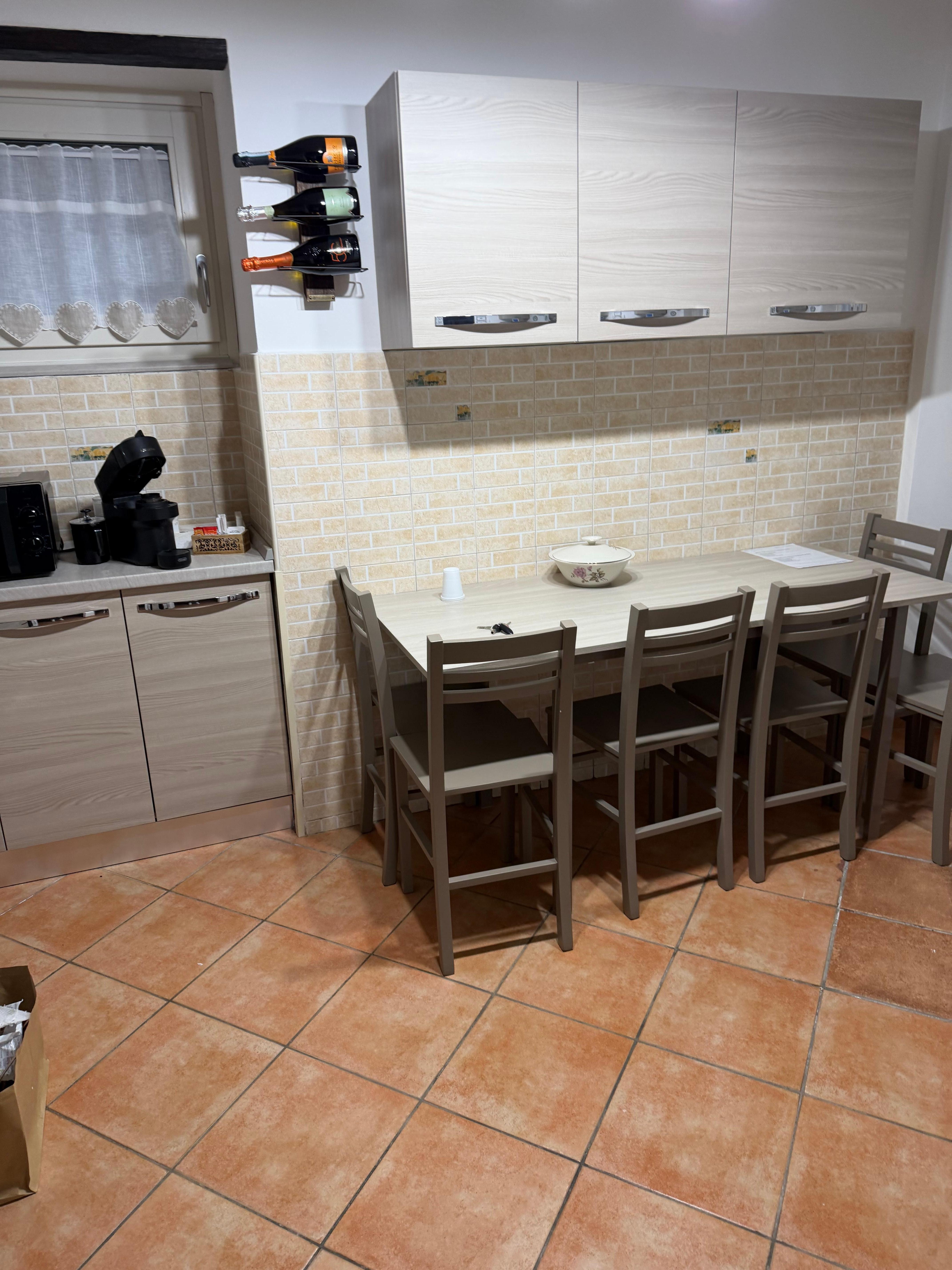 The kitchen/dining room offered is enough space to enjoy wine and conversation!