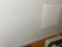 Smear marks on the wall in the bedroom