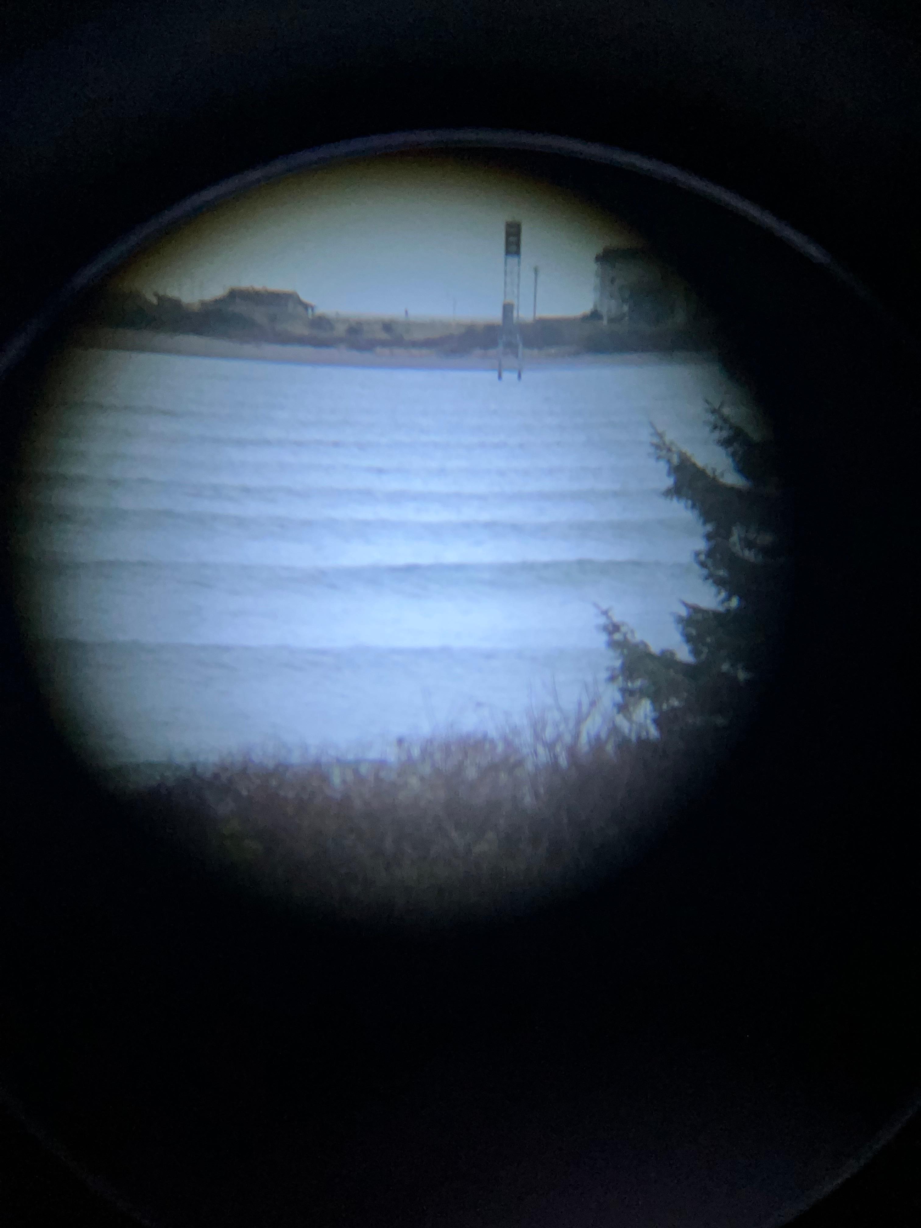 View of the bay with swell lines coming in. 