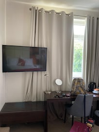 Large TV and dressing table.