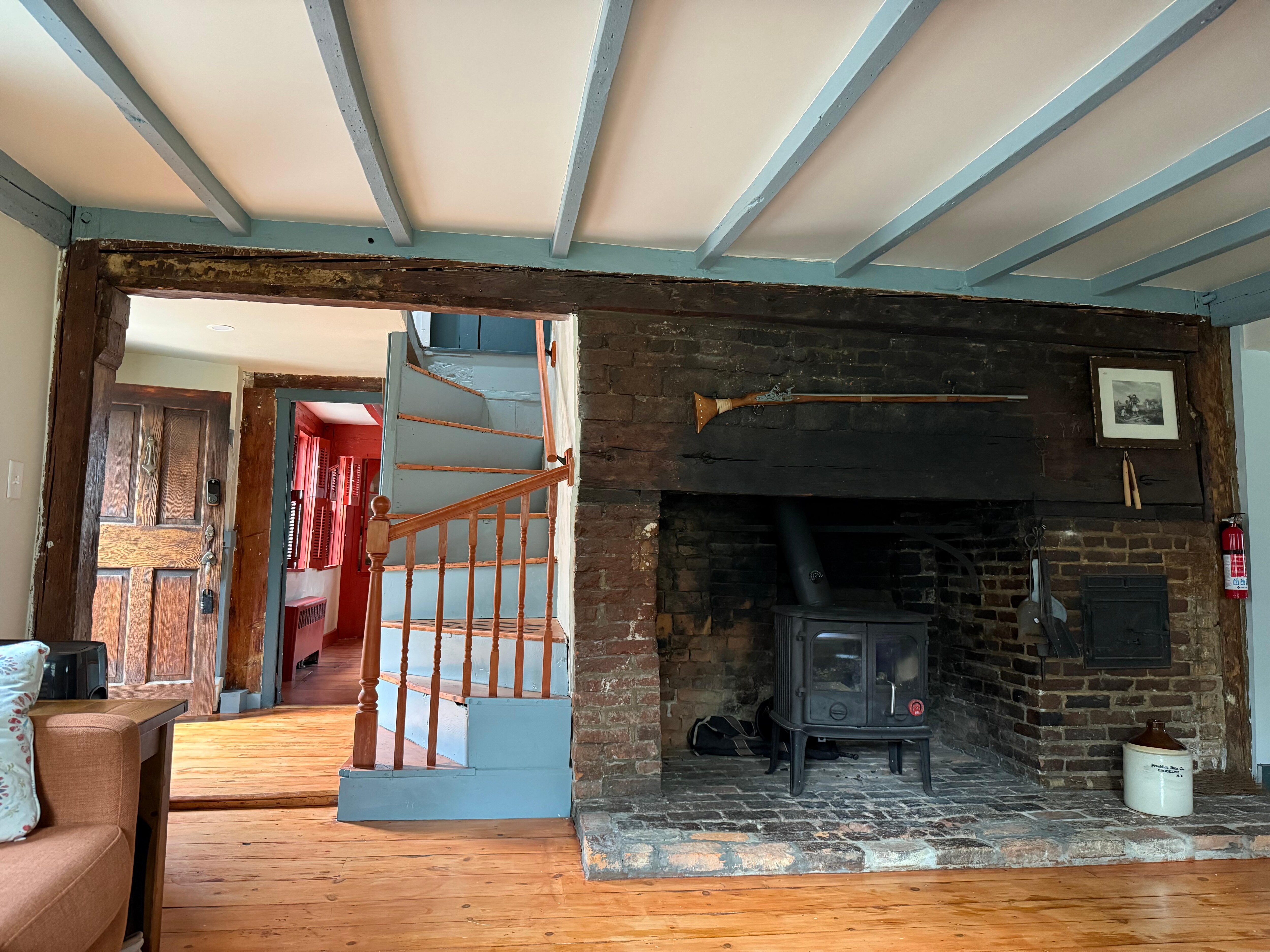 Living room view of fireplace and stairs. Big steps!