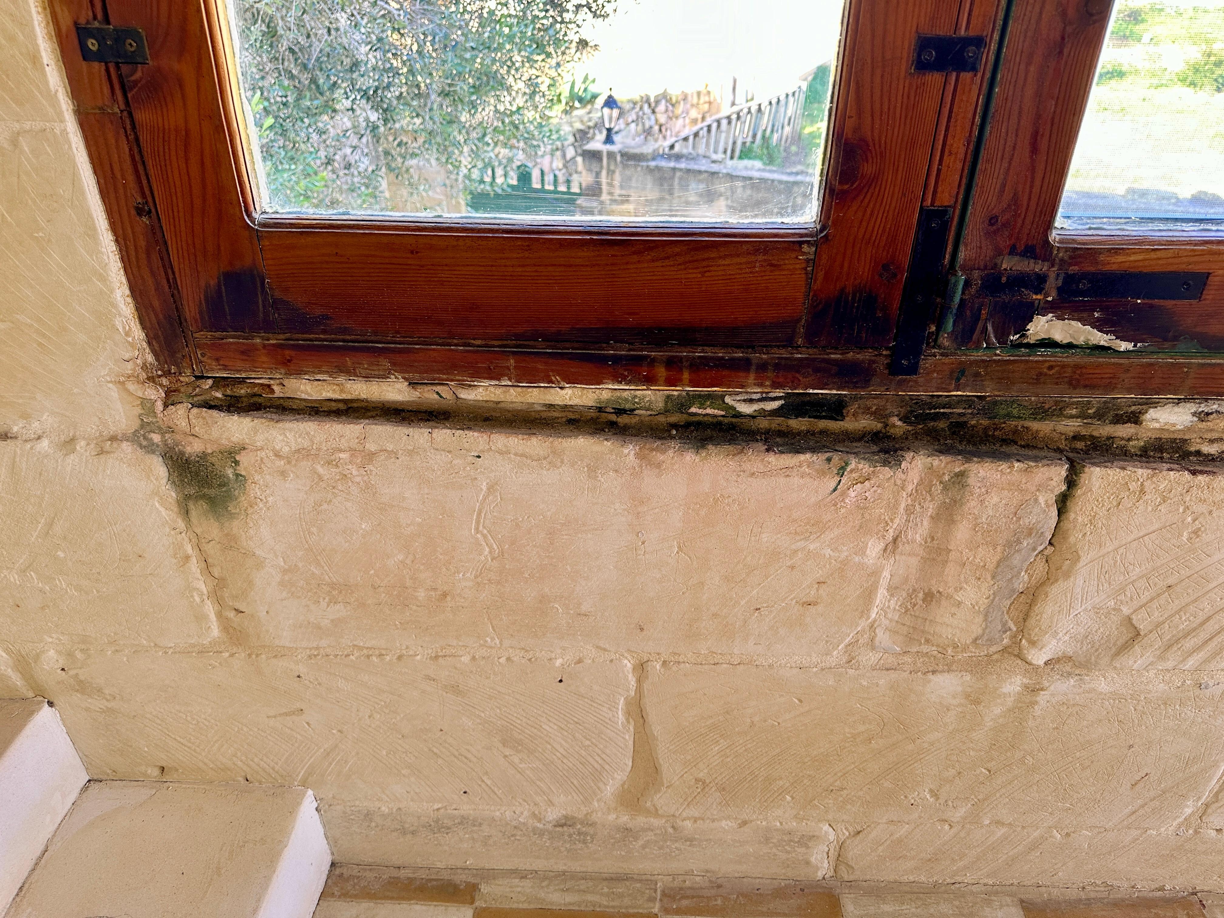 Damp walls outside bedrooms