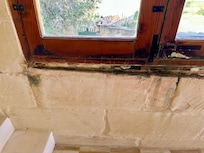 Damp walls outside bedrooms