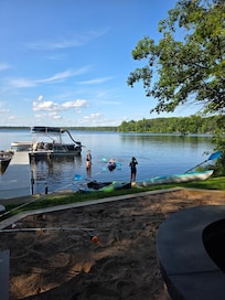 Sand Lake was amazing! It was never "busy" the whole week we were there. Other boaters were considerate of kayakers. My 7 year old daughter learned how to kayak in the shallow shoreline, which is mostly smooth rocks and the water is SO clear!