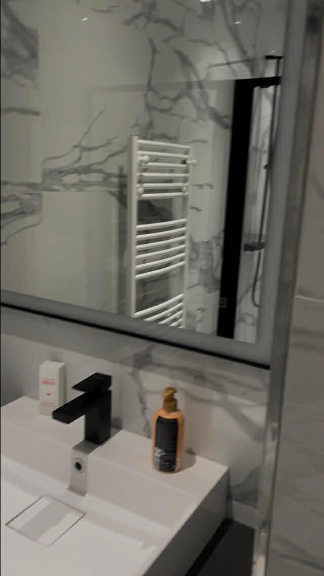 Bathroom #2.  Only a shower and sink next to the kitchen.