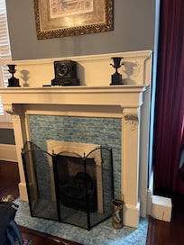 Fireplace in our bedroom. Loved the turquoise tile.