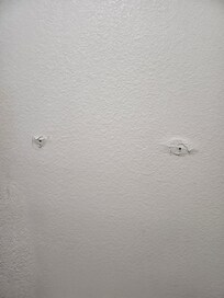 No towel holder, no towels.