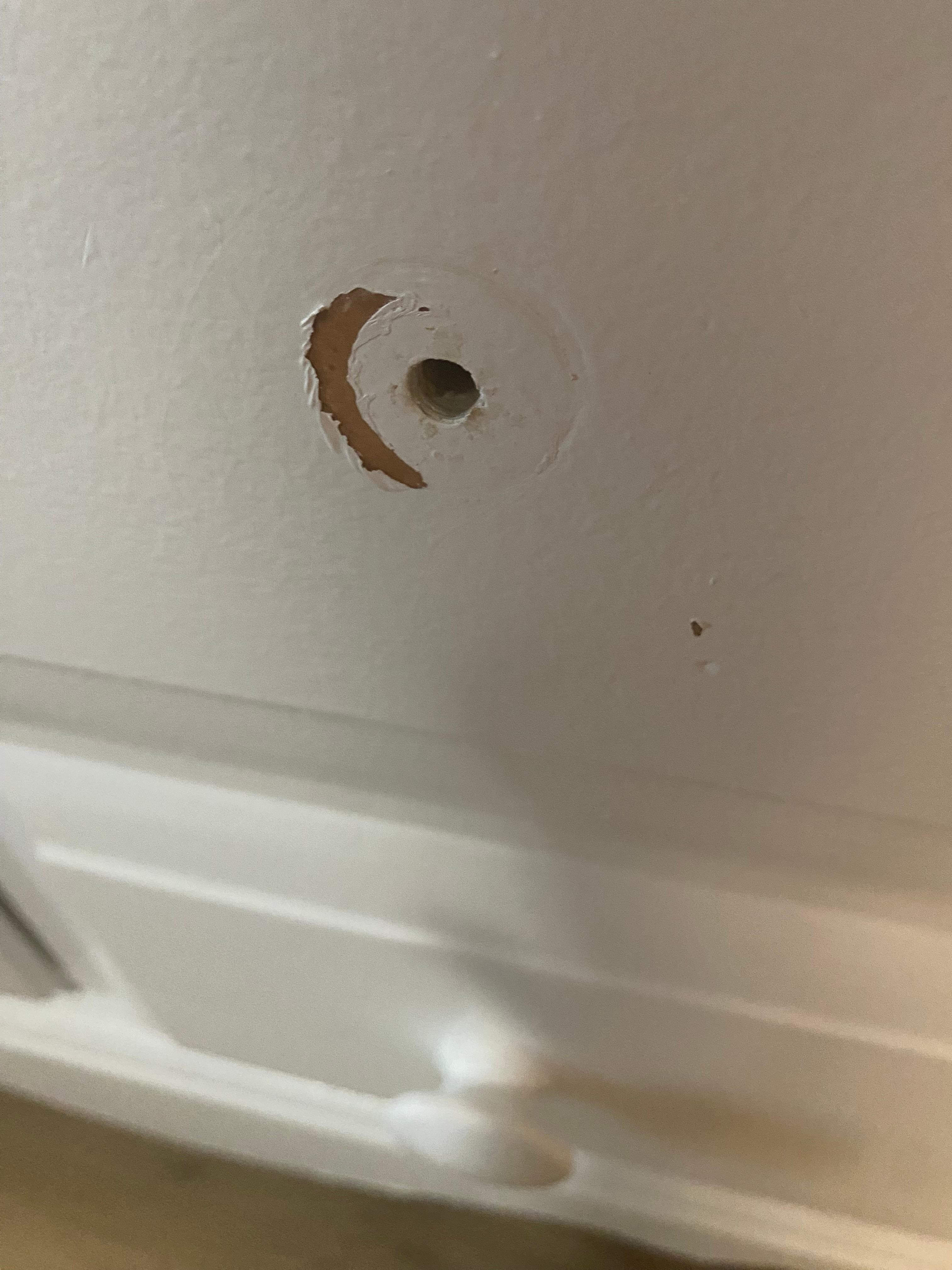 Knob on dresser with sharp screw exposed which I removed