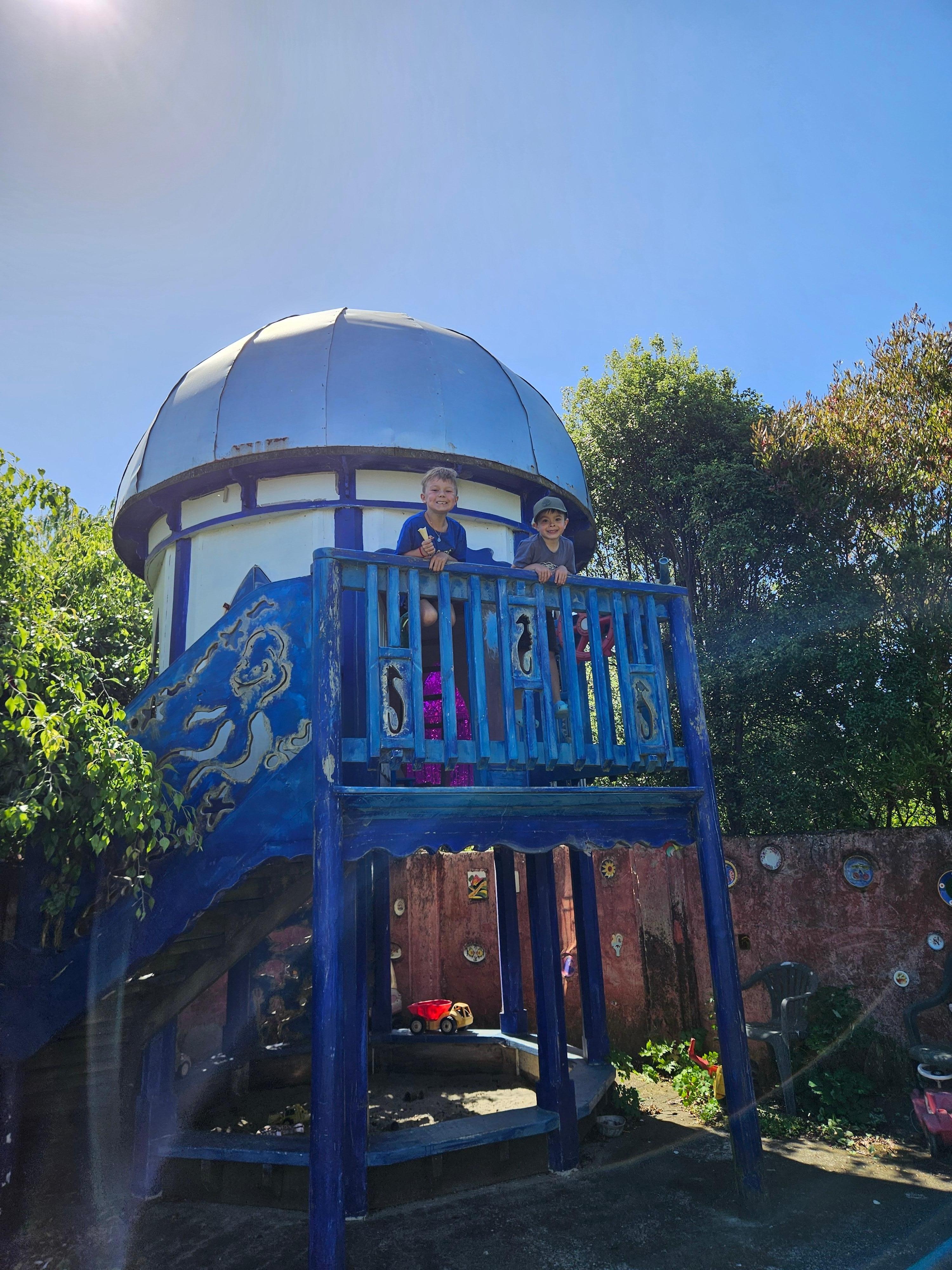 Sandpit and playhouse.