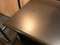 Sticky finger prints on the TV cabinet.