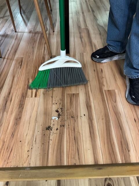 There’s a layer of dust on top of the water heater and a layer of dust on top of the refrigerator. The outside area there’s a glass table that’s covered with dust and it’s been wet and it’s messy. It wouldn’t be able to be used by anyone.