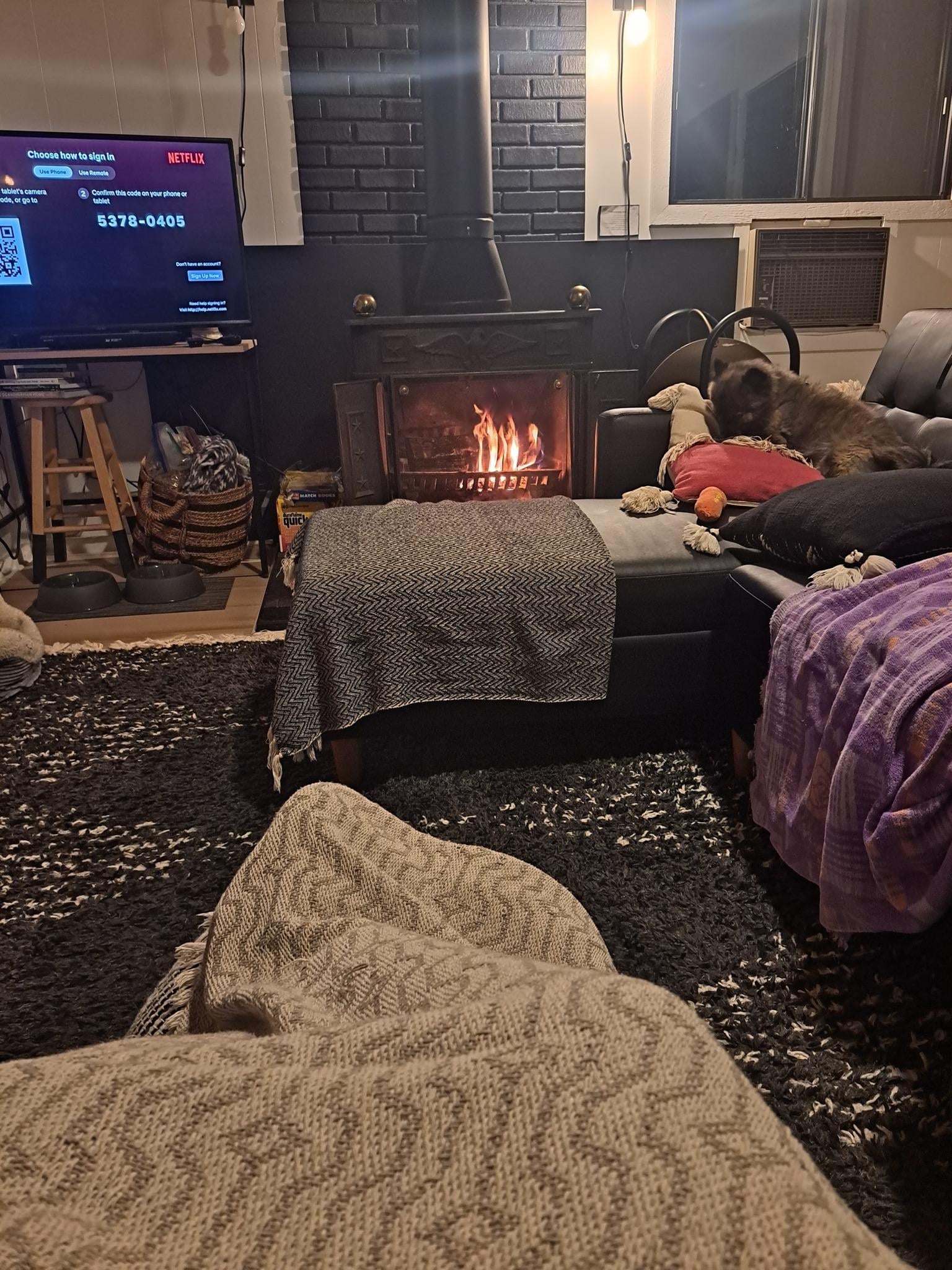 The coziness of sitting by the fire.