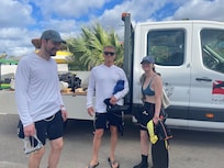 Preparing for a dive. Scoobydo did a great job guiding our dives