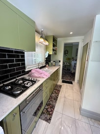 The kitchen has everything required to cook a meal.