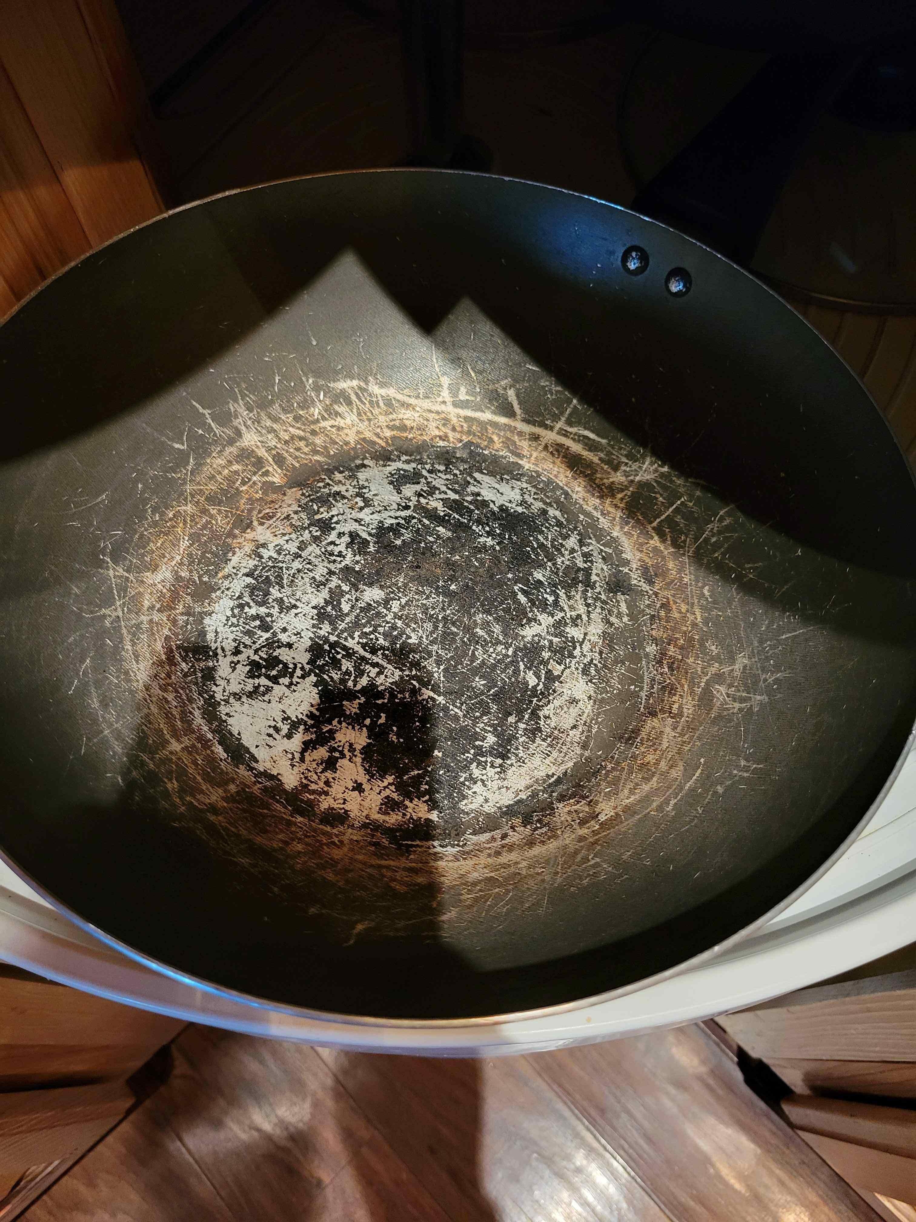 severely scratched pan