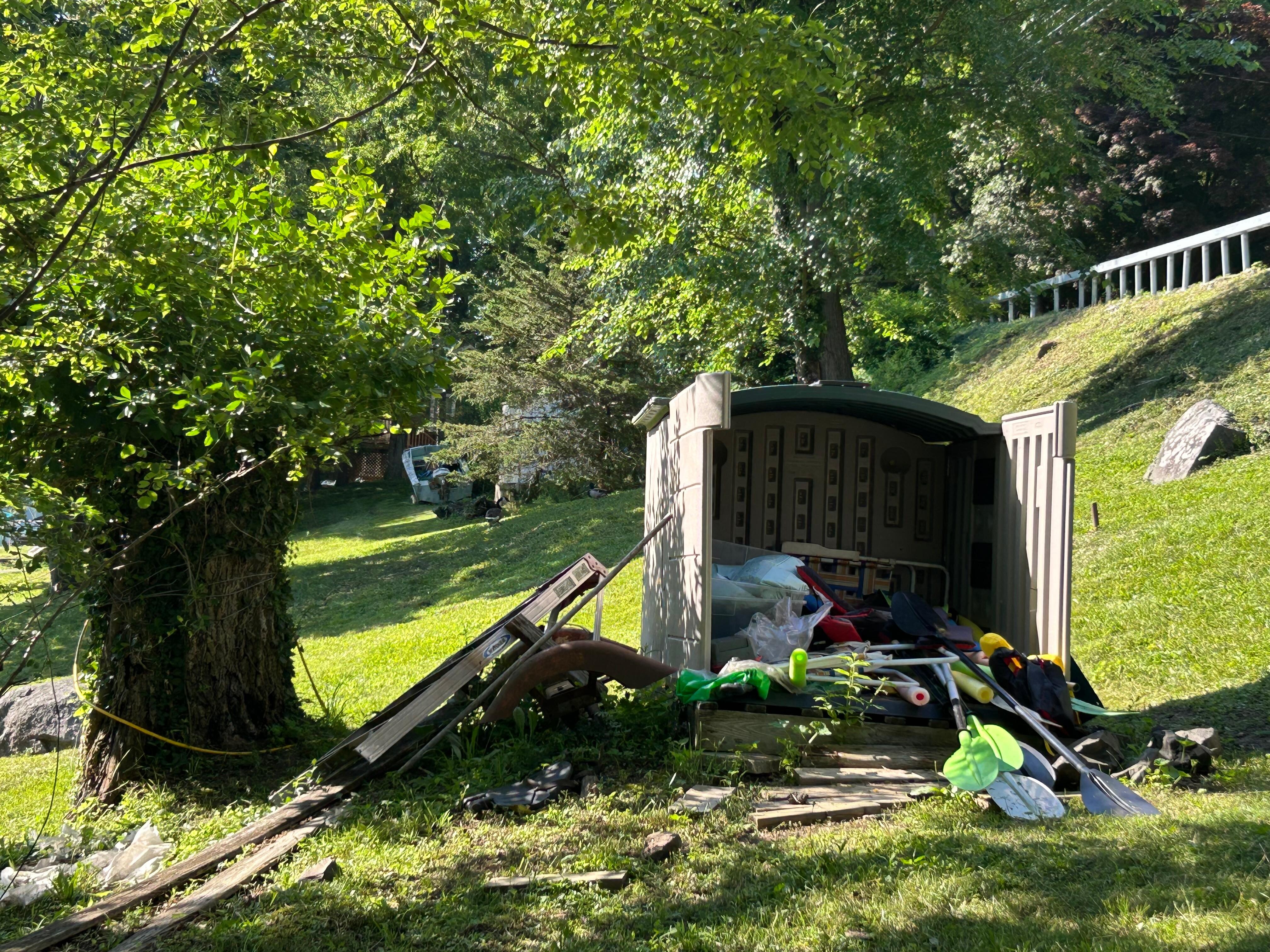 Water equipment shed fell apart leaving life vests & oars out in the open and looked like a trash pile.