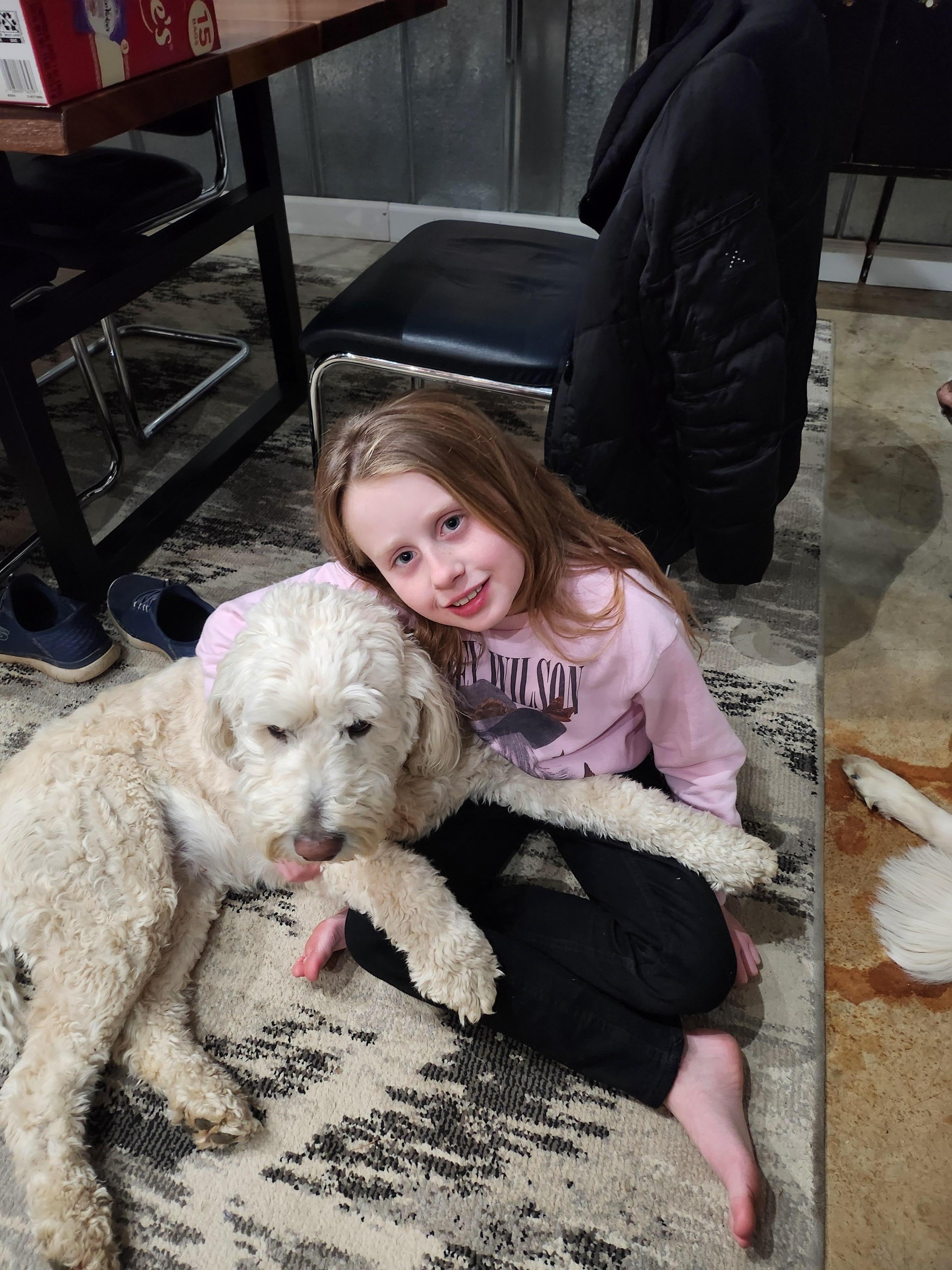 One of the fur babies and pur granddaughter
