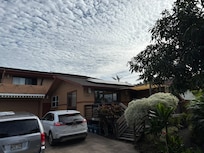 Outside front of house.