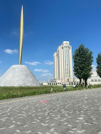 The view of the beautiful hotel from  a nearby walking path