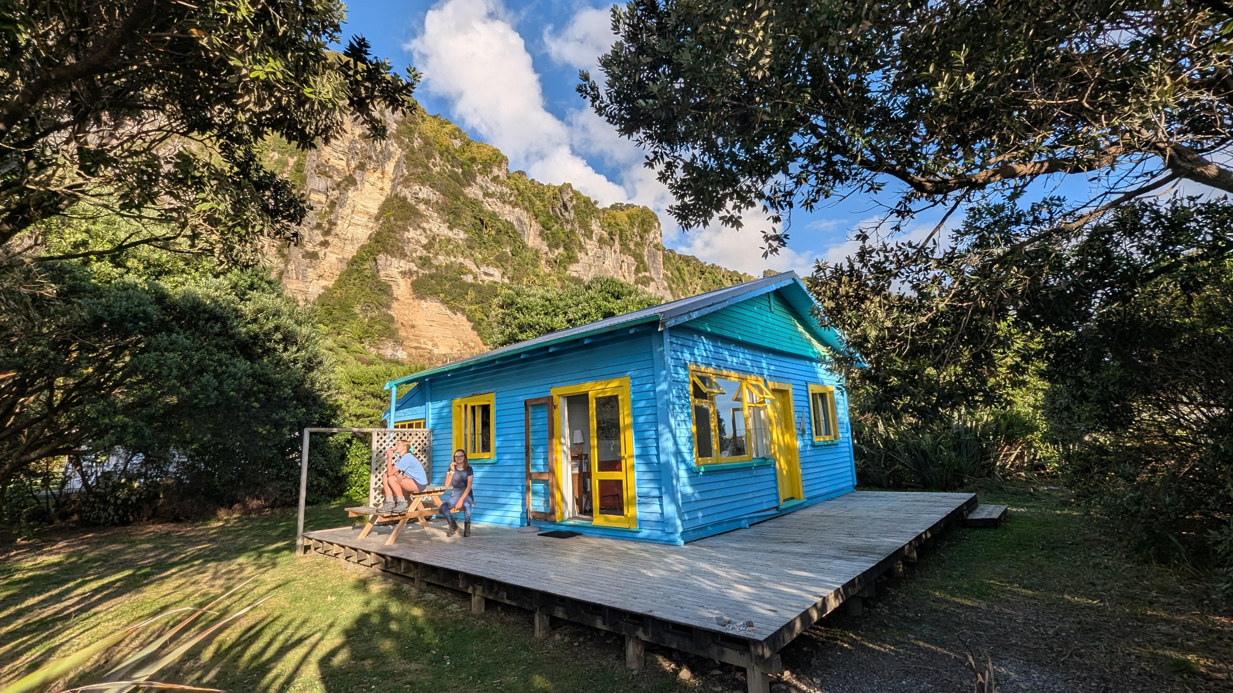 Bach and it's deck with cliffs behind