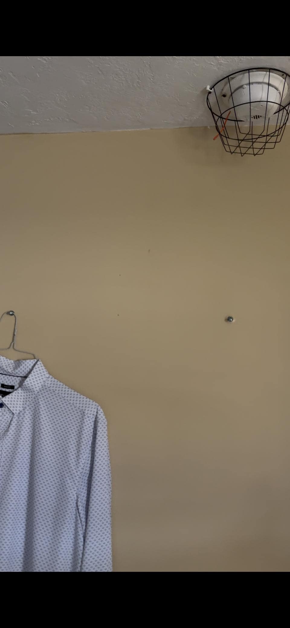 No closet, used a screw where maybe a painting was missing from. 