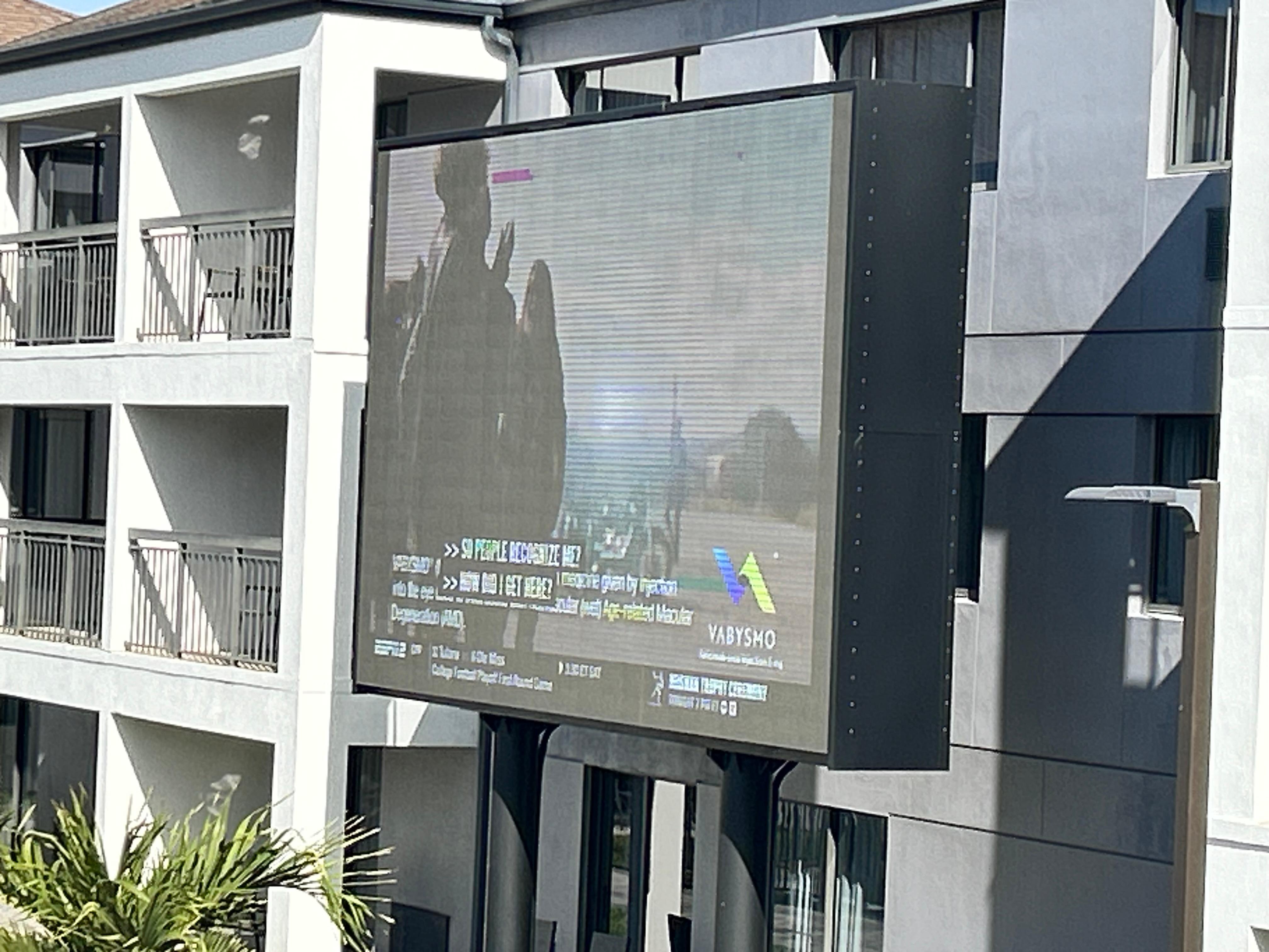 Large TV at main pool