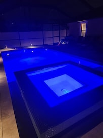 Pool & hot tub at night.