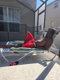 My brother enjoying the sun