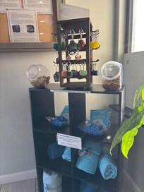 Pet complimentary pet corner with towels, Treats, waste bags, coat wipes AND little pet keychains!