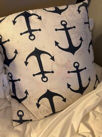 Decorative pillow with big pink stain was on the bed when we arrived.