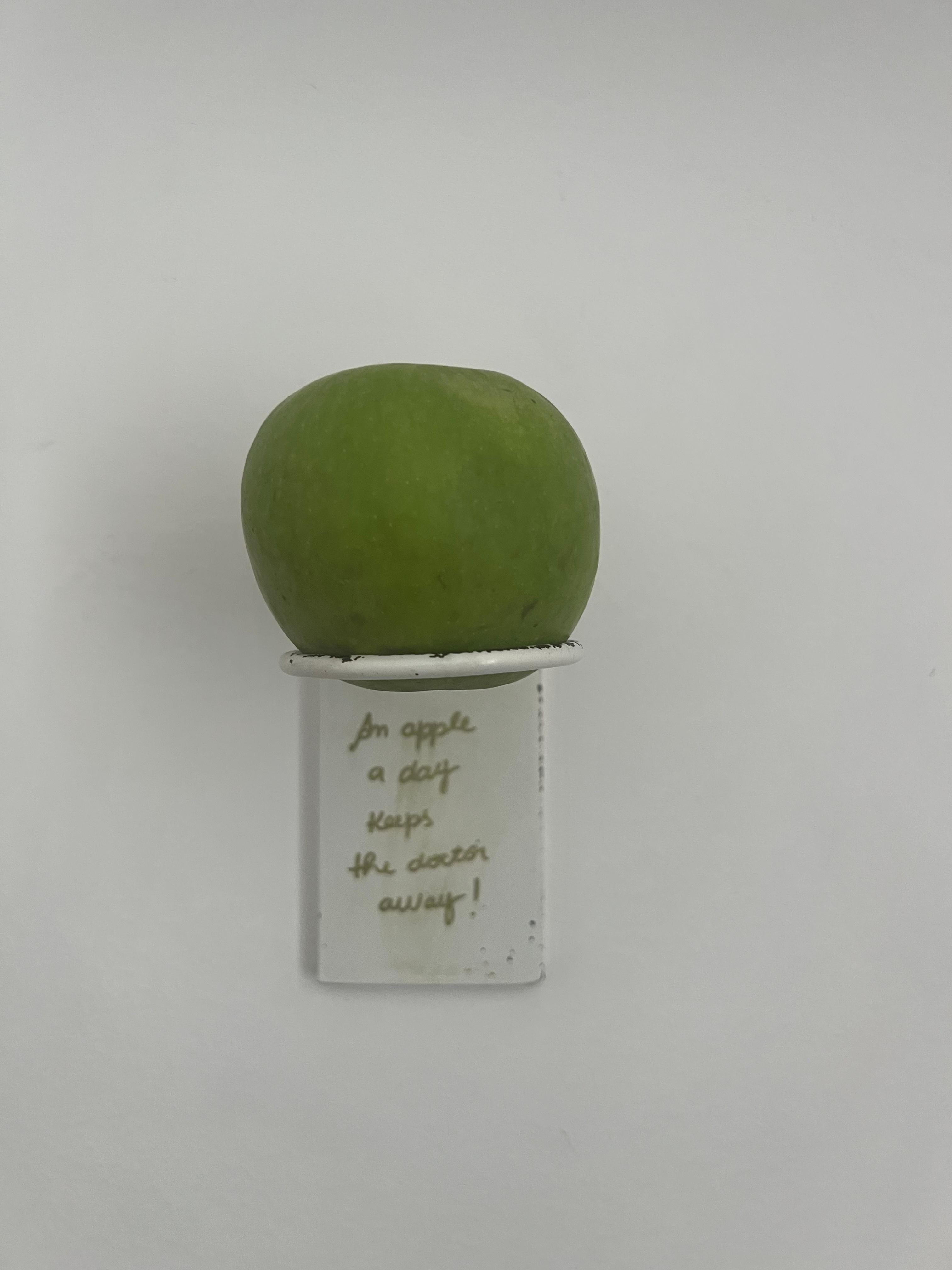 Cute "Apple A Day" on the wall.