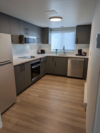 Kitchen with oven, and dishwasher